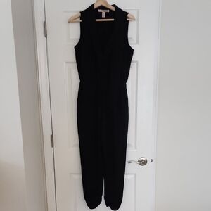Sleek Black Jumpsuit with High Neckline and Tapered Pants